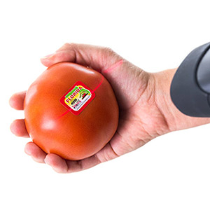 Tomato label with barcode being scanned